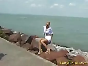 Doll urinates on beach