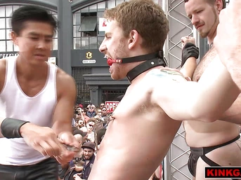 Dude gets his balls crushed in public during a crazy BDSM show!