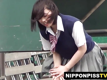 Japanese teen with hairy pussy and kneehighs gets wild outdoor pee & pussy play
